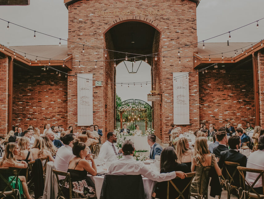 Guests gathered at a wedding reception at The Hare Wine Co. in Niagara-on-the-Lake.