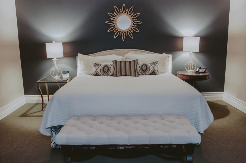 King bed in Vintner’s Loft Guest Suite at Inn On The Twenty in Jordan Village