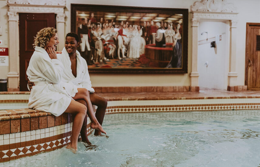 Couple relaxing at the pool at the Prince of Wales Hotel in Niagara-on-the-Lake