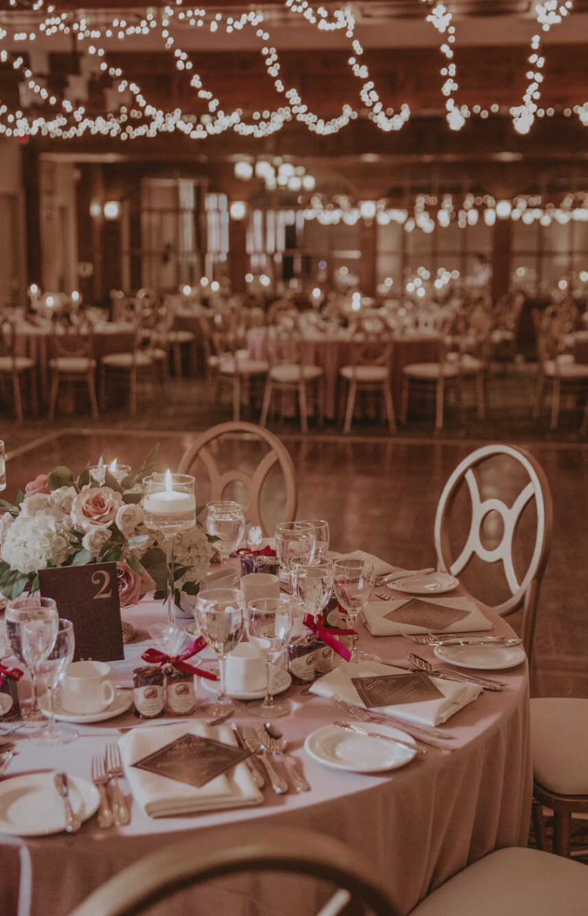 Table setting and ambience at the Upper Canada Hall Ballroom wedding venue at the Pillar & Post in Niagara-on-the-Lake
