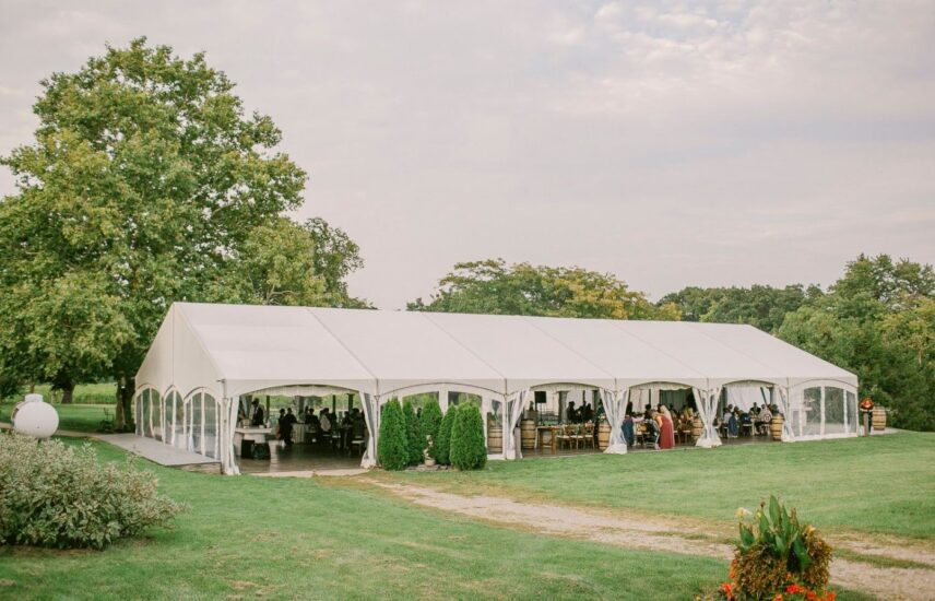Guests gathered at a tend wedding at Sue-Ann Staff Winery in Niagara-on-the-Lake.